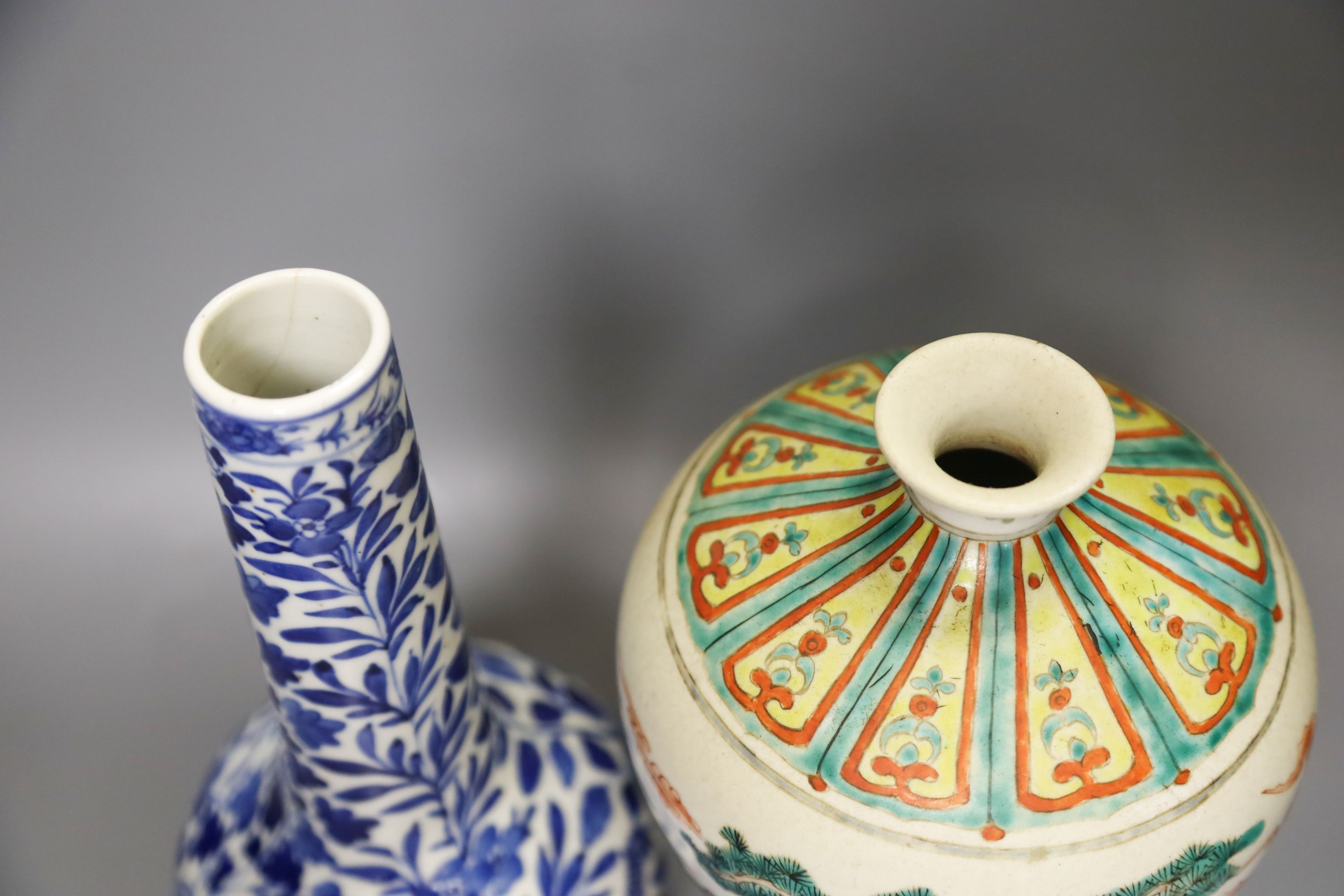 A Chinese famille verte meiping, two Chinese blue and white vases (both damaged) and a Masons vase, 19th/20th century Tallest 26cm